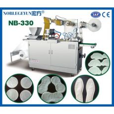 NB-330型暖寶寶包裝機，全自動發(fā)熱貼生產(chǎn)設(shè)備